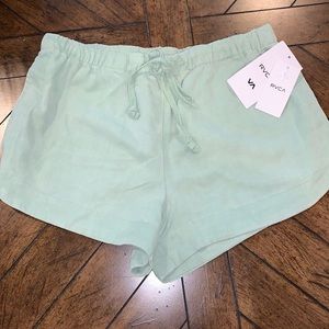 RVCA shorts in mint green, size small.
